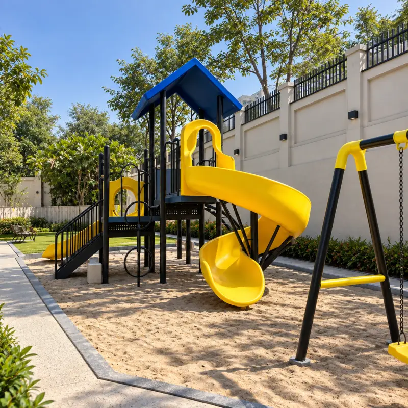Kids' play area with slide and swings on sand